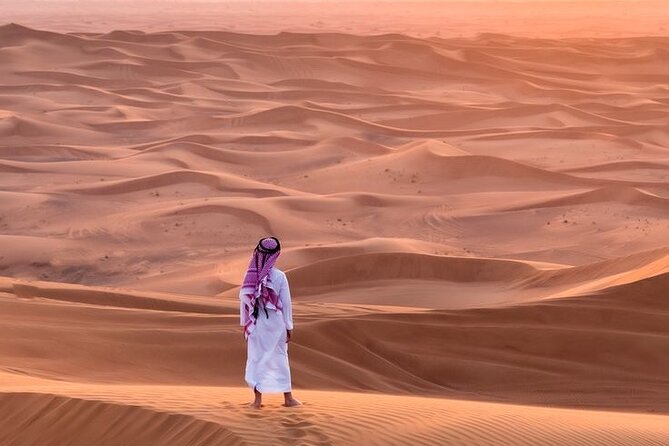 4hr Desert Safari: Sunset,Sunrise,Camel,Sand boarding,Inland Sea - Sandboarding from the high dunes