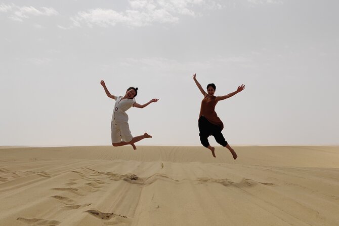Desert Safari, Quad Bike, Sandboarding and Camel Ride - From Doha to Mesaieed, the road sets the scene