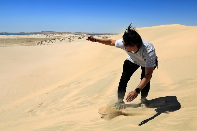 Desert Safari with Camel Ride, Sand Boarding & Inland Sea Tour in Doha - Pickup timing and the ride south