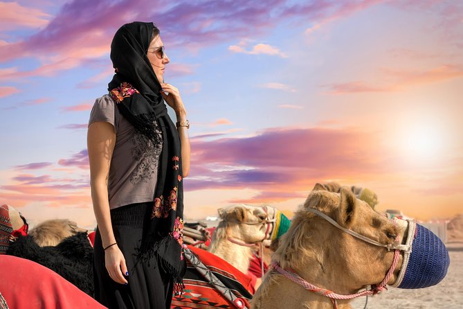 Desert Safari with Camel Ride, Sand Boarding & Inland Sea Tour in Doha - Camel riding at the desert camp
