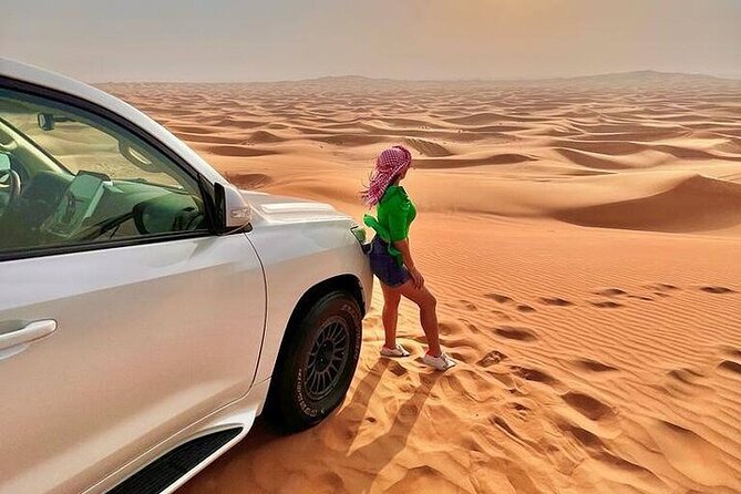 Desert Safari with Quad Bike Camel ride ,SandBoarding ,InalndSea - Dune Driving Across Qatar’s Sand