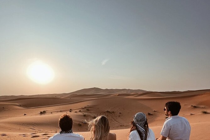 Desert Safari with Quad Bike Camel ride ,SandBoarding ,InalndSea - The Desert Arrival Stop and a Practical Pause