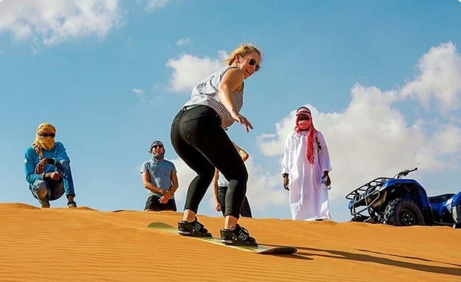 Doha: ATV, Quad or Buggy, Dune Bashing, Camel & Sandboarding - Quad Biking Across the Sand
