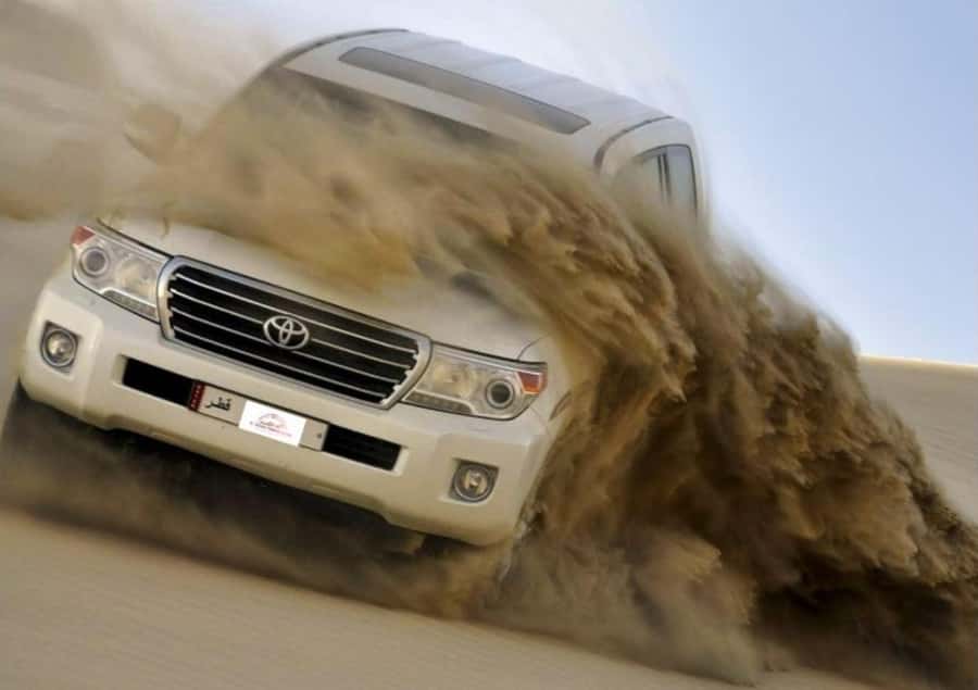 Doha: Budget Friendly Desert Safari,CamelRide & Sandboarding - Camel riding and a taste of desert tradition
