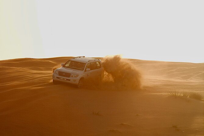 Doha Delights City Tour with Desert Safari and Inland Sea Visit - A quick photograph at the I Love Lusail statue