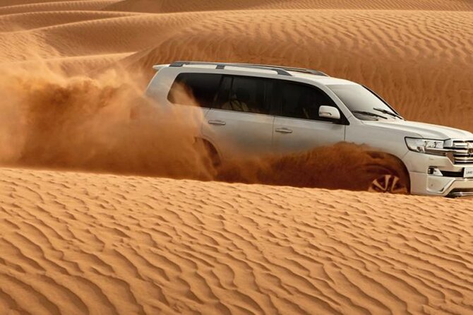 Doha Desert Quad Bike adventure with group, and Sand dune Driving - Sunset Over the Inland Sea