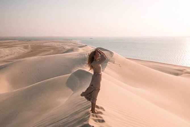 Doha: Desert Safari | Camel ride | Sand-boarding | Quad Biking - Quad biking across the sand