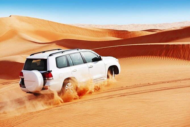 Doha Desert Safari Camel Ride, Sandboarding and Inland Sea - Dune bashing in a 4x4