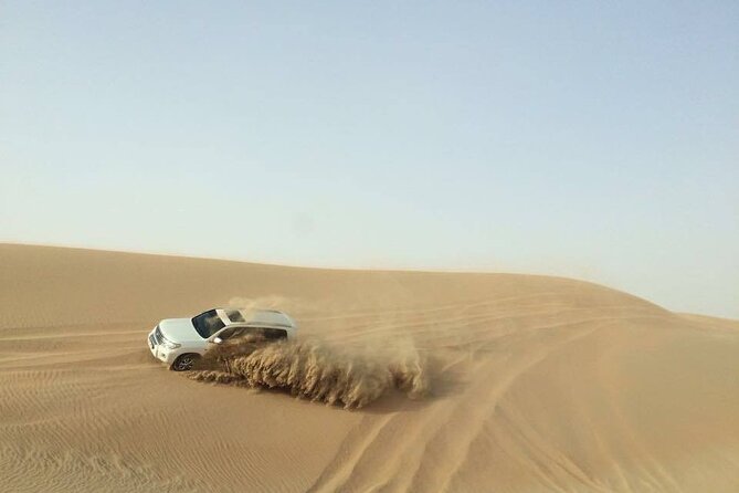 Doha Desert Safari Dune Bashing Camel Ride - Sandboarding on Qatar’s Golden Dunes