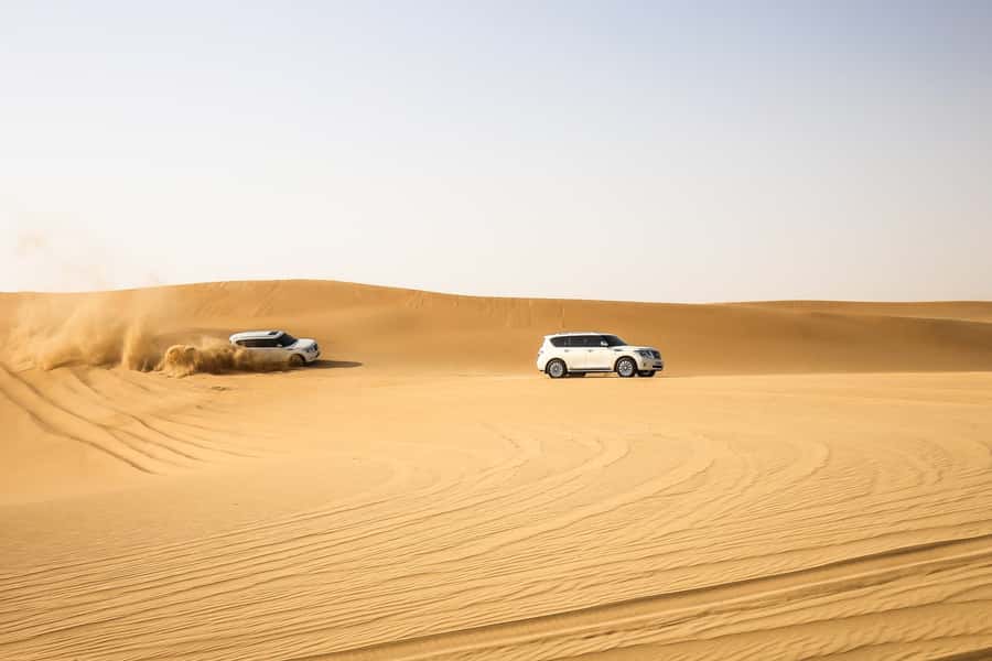Doha: Desert Safari Dune Bashing, Sandboarding, & Camel Ride - Sandboarding without an extra charge
