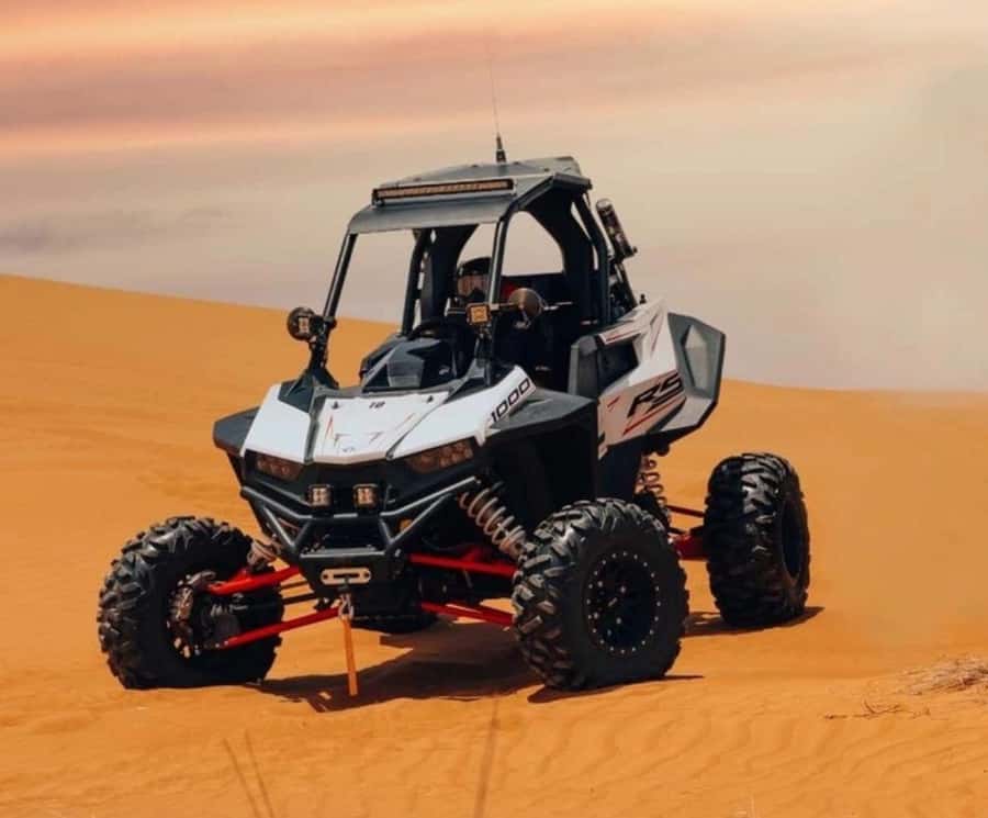 Doha: Desert Safari, Quad Biking, Sand Boarding & Camel Ride - Sandboarding with a view