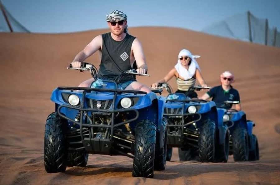 Doha: Desert Safari, Quad Biking, Sand Boarding & Camel Ride - Leaving Doha for the sand
