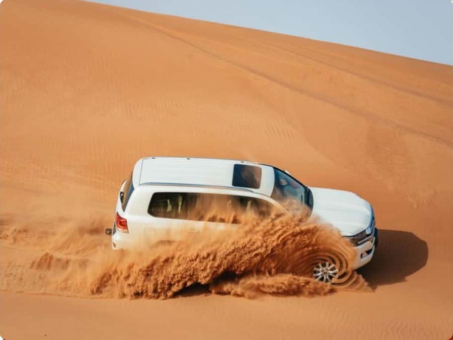 Doha:Desert Safari with Camel Ride, ATV Bike,& Sand Boarding - Pickup from Doha keeps the day simple