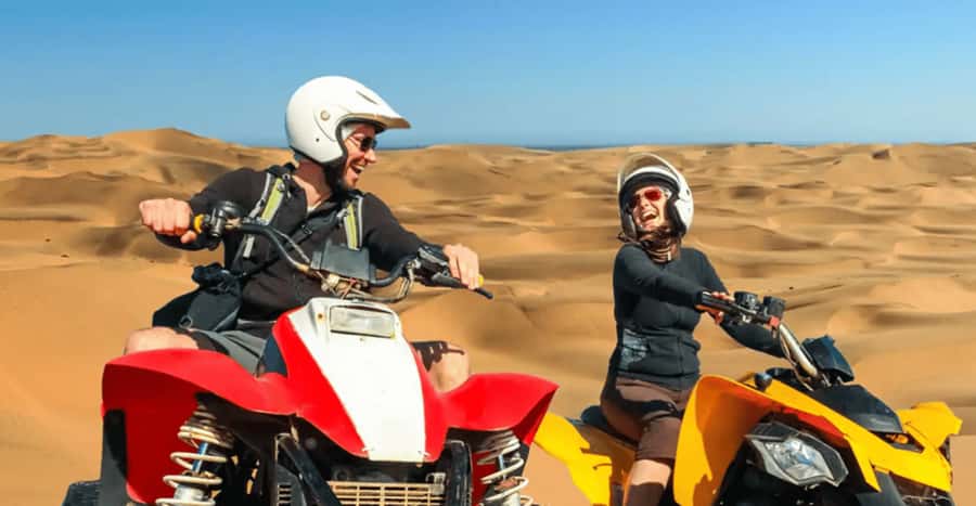 Doha: DesertSafari with Quad Bike, Camel Ride & Sandboarding - Khor Al Adaid, where dunes meet the sea