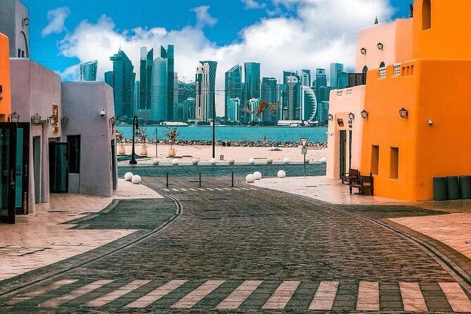 Doha: Half Day City Tour with Pickup and Drop-off - Old port, dhow harbor, and Corniche: Doha beside the water