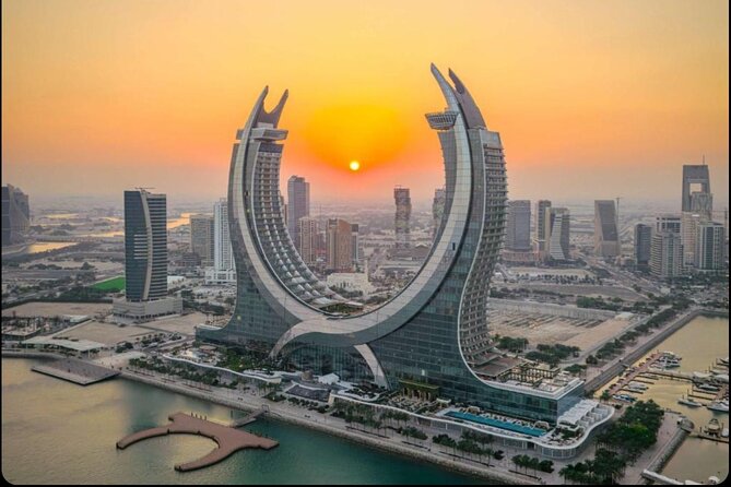 Doha: Half Day City Tour with Pickup and Drop-off - Katara Cultural Village: an hour among public arts spaces