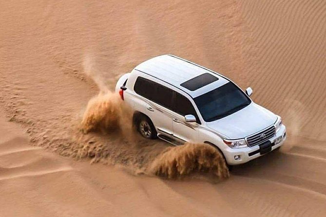 Doha :Half Day Desert Safari | Camel Riding | ATV | Sand Surfing - Sealine Beach, tea, camels, and the first pause