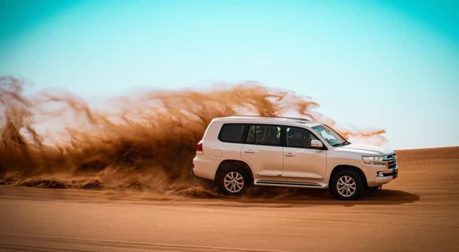 Doha: Half Day Desert Safari, Dune Bashing, Camel Ride - Dune bashing near Ash Shaqra’