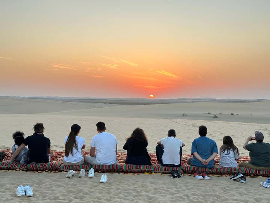 Doha: Half-Day Desert Safari, Quad Bike, Camels & Inland Sea - Sandboarding is simple, funny, and worth trying