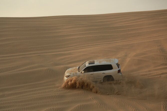 Doha: Half Day Desert Safari with Camel Ride and Inland Sea Tour - Sandboarding on the Smooth Dunes