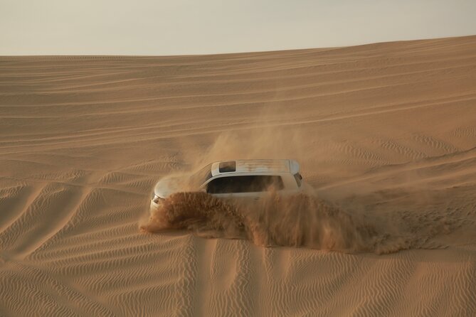 Doha: Half Day Desert Safari with Camel Ride and Inland Sea Tour - Khor Al Adaid: Where Sand Meets the Gulf
