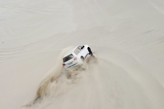 Doha-Half Day Safari with Quad Bike ATV/Camel Ride/sandboard - Camel riding adds a slower desert moment