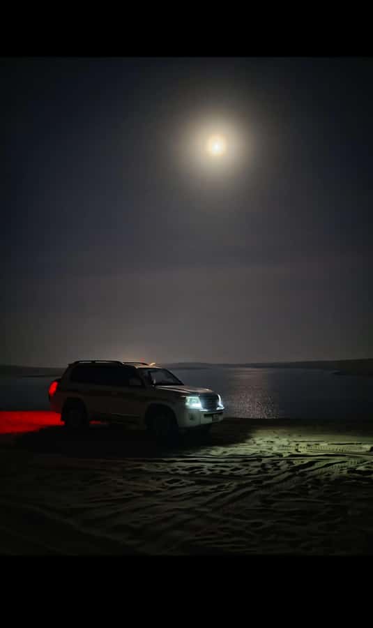 Doha: Night DesertSafari DuneBashing Sandboarding CamelRide - Moonlit photo stops in the sand