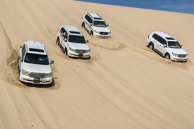 Doha Qatar ATV Quad Bike Buggy Desert Adventure and Camel Ride - Khor Al Adaid, where the desert meets the Gulf