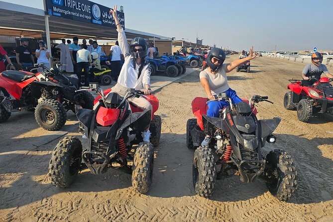 Doha Qatar ATV Quad Bike Buggy Dune Bashing and Camel Ride - Who will enjoy this desert day?