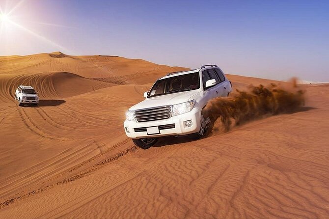 Doha: Quad Bike, Dune Bashing, Camel Ride & Inland Sea Tour - Dune bashing near Qatar’s Inland Sea