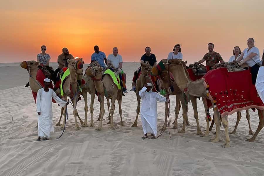 Doha Safari: ATV Ride, Dune Bashing, & Sandboarding Fun - Tea and a short camel ride at the desert camp