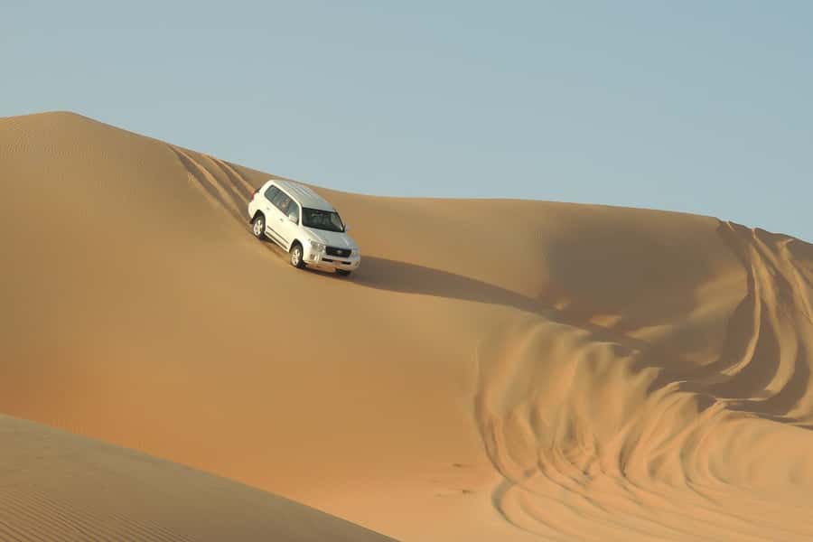 Doha Safari: ATV Ride, Dune Bashing, & Sandboarding Fun - ATV riding near Mesaieed