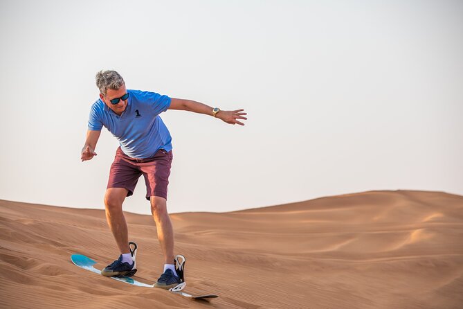 Doha: Sunset Desert Safari, Camels, Sandboarding & Inland Sea - Dune bashing in a capable 4x4