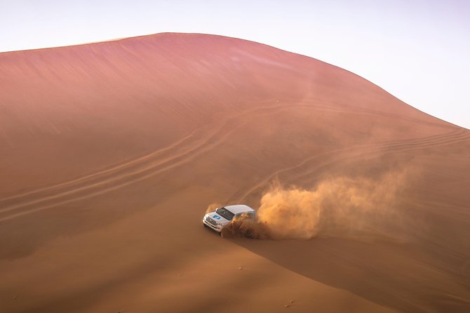 Doha: Sunset Desert Safari, Camels, Sandboarding & Inland Sea - Pickup from Doha and the ride south