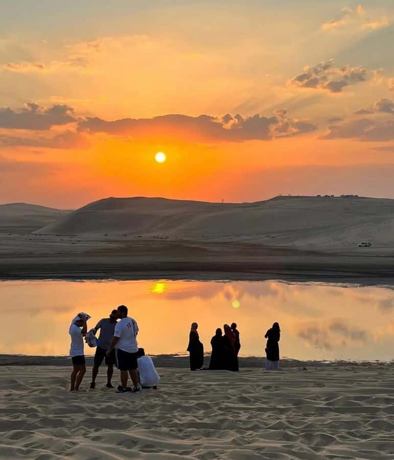 Doha: Sunset Desert Safari with Camel Ride & Sandboarding - Sandboarding on the desert slopes