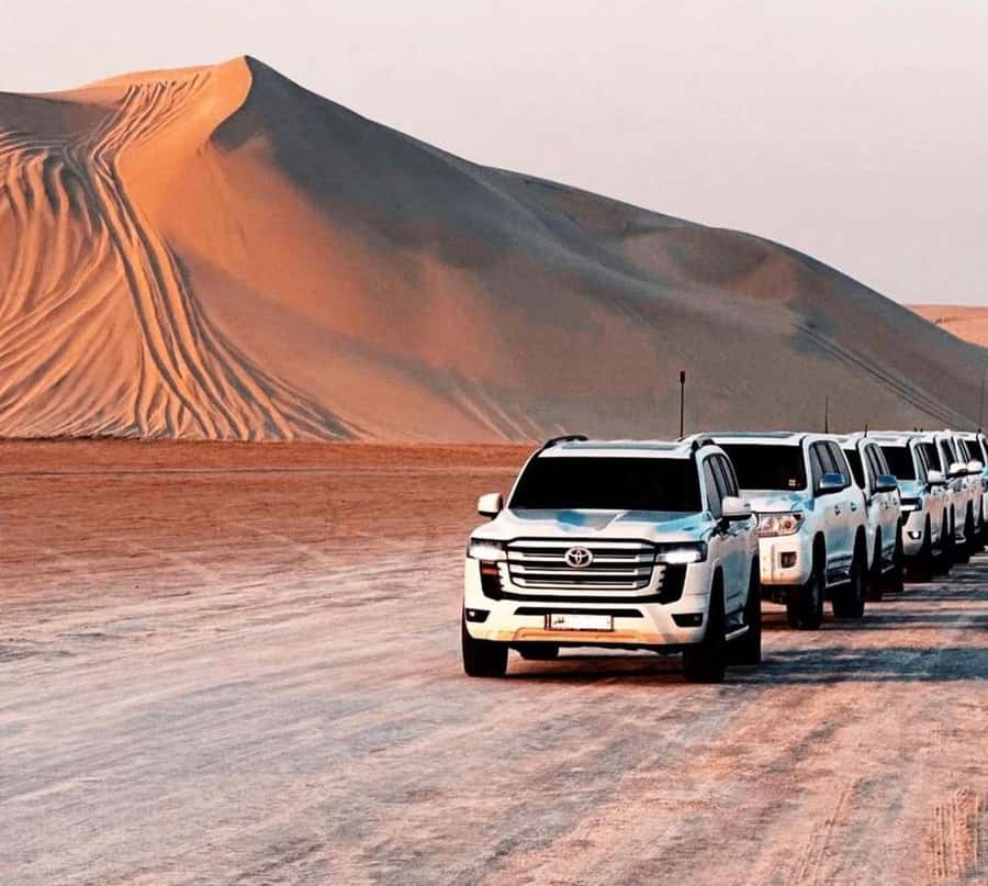Doha: Sunset Desert Safari with Camel Ride & Sandboarding - Sunset at the Inland Sea
