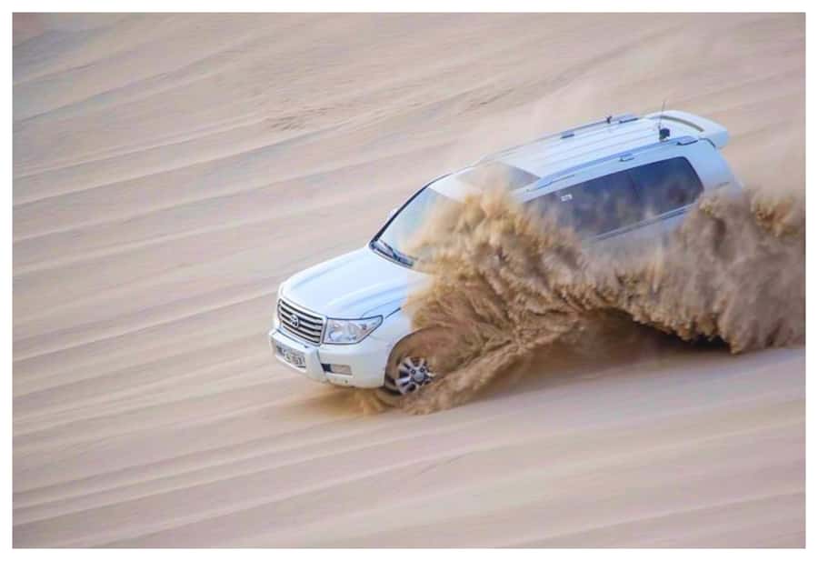 Dune Bashing, Sandboarding, Camel Ride & Optional ATV Ride - Why this four-hour desert safari works