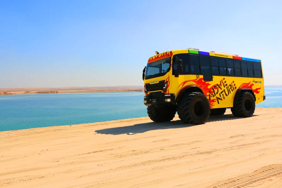 From Doha: Exclusive Monster Bus Safari Experience - Forty-five minutes over the Sealine dunes