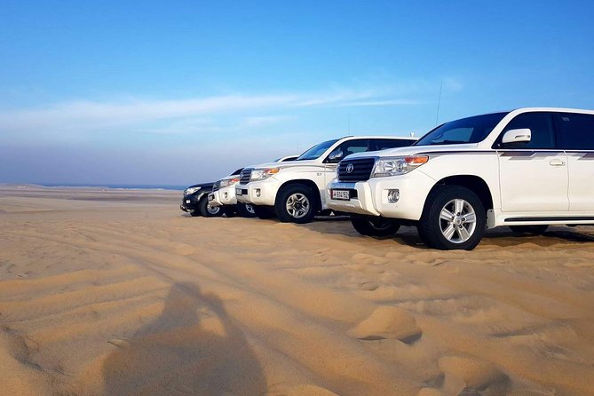 Half Day Desert Safari || Sand Boarding || Camel Ride || Inland Sea Visit || - Camel rides, quad biking, and unclear extras