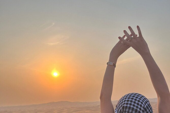 Half Day Desert Safari with Sand Boarding and Camel Ride - Dune bashing in a 4X4 vehicle