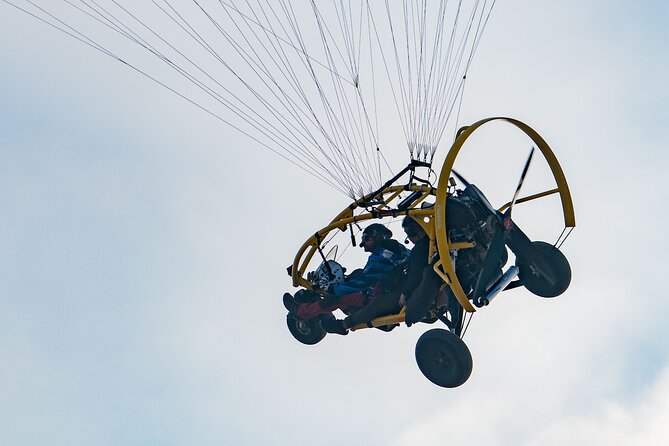Paratrike Air Tour Doha - Sitting in the Xcitor while the pilot takes control