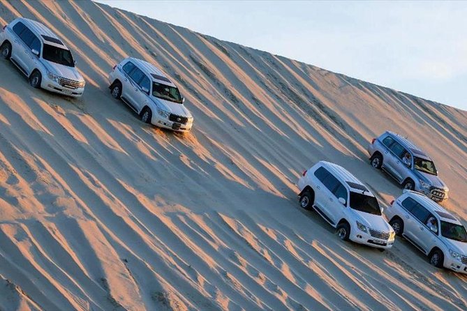 Premium Full-Day Safari, Dune Bash, Camel Ride and BBQ Meal in Desert Camp - A Bedouin-inspired camp beside the beach
