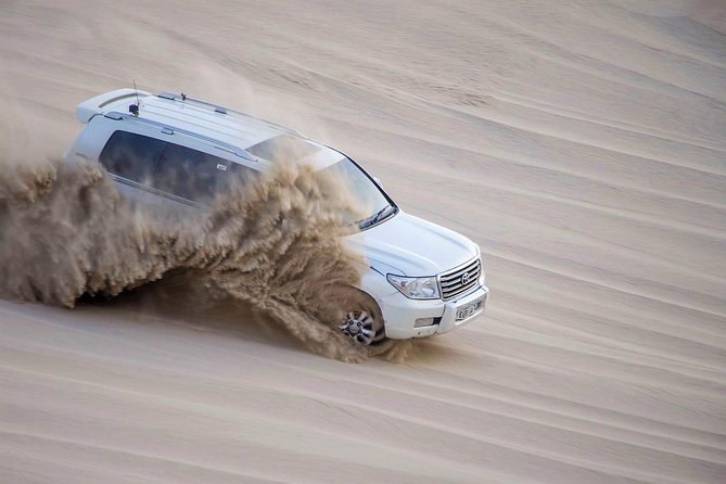 Qatar Gold Dune Safari, Dune Bashing,Camel Ride,Sand Boarding,Inland Sea Desert - Tea, water, and a pause in the sand