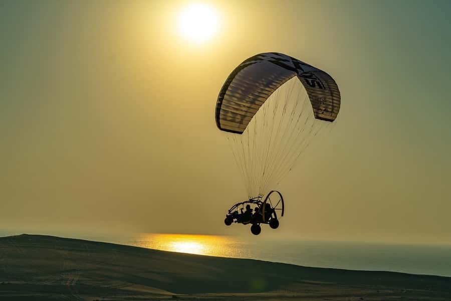 Qatar: Paratrike Air Tour with Hotel Transfers - Preparing for takeoff with an English-speaking pilot