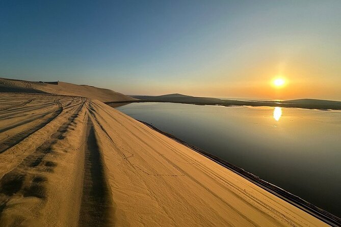 Qatar: Sunrise or Sunset Desert Tour in Doha, unforgettable trip - Sealine Beach: tires, camels, and a choice of extra speed