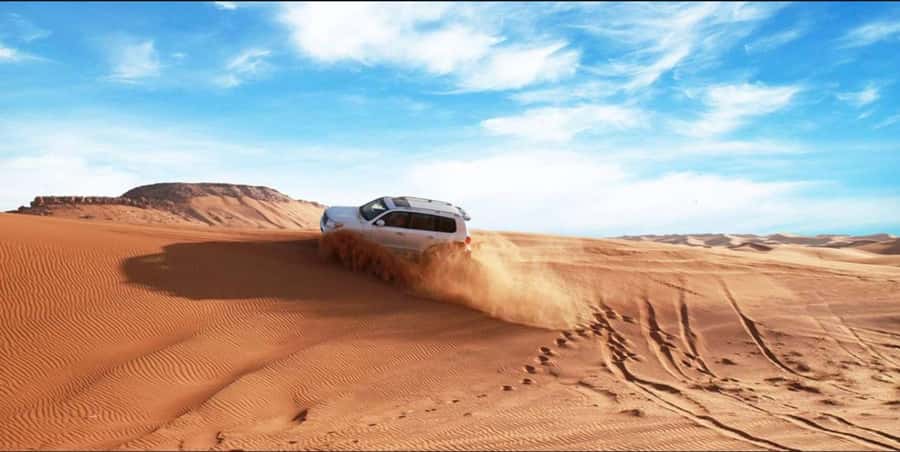 Quad Bike/Buggy, Desert Safari, Camel Ride, Dune Bashing - Sandboarding with time to try again