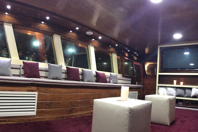 See Doha from the Sea - The Pearl and its towers and yachts