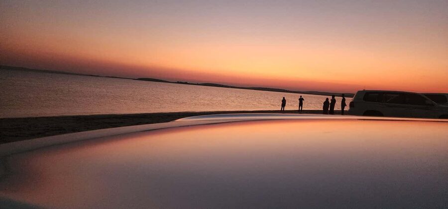 Sunrise or Sunset desert Safari with Sandboarding in Qatar - Leaving Doha behind for the open desert