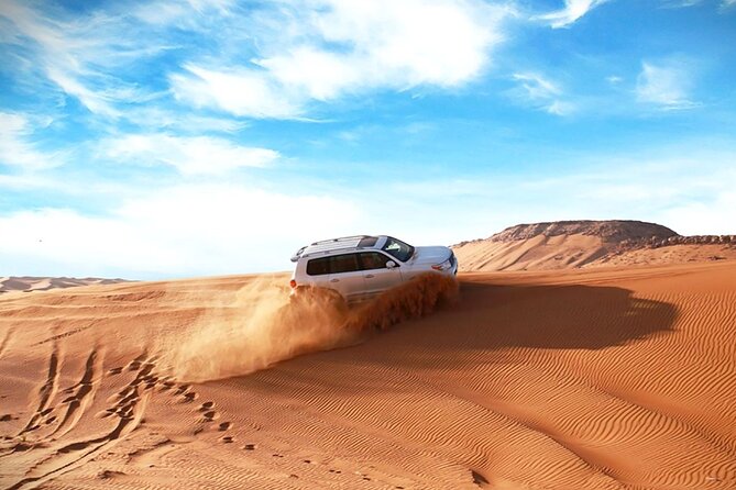 Thrilling 4-Hour Dune Bashing & Camel Ride Safari to Inland Sea - Leaving Doha in an air-conditioned 4x4