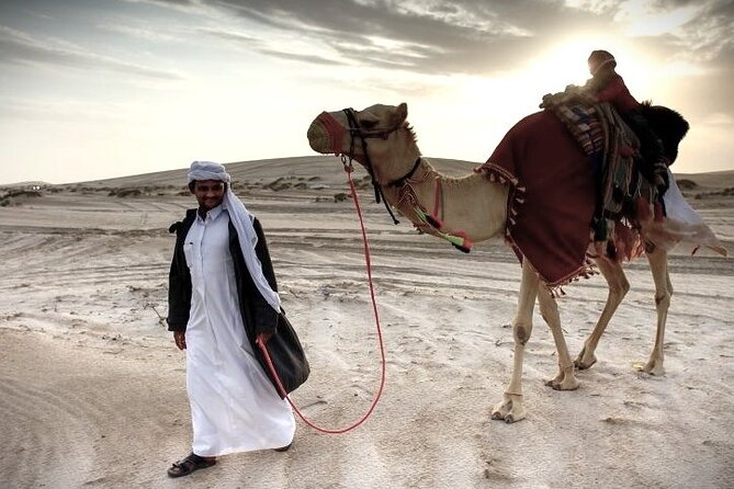 Thrilling 4-Hour Dune Bashing & Camel Ride Safari to Inland Sea - Sealine Beach and the short camel ride